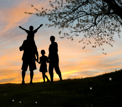 family together at sunset